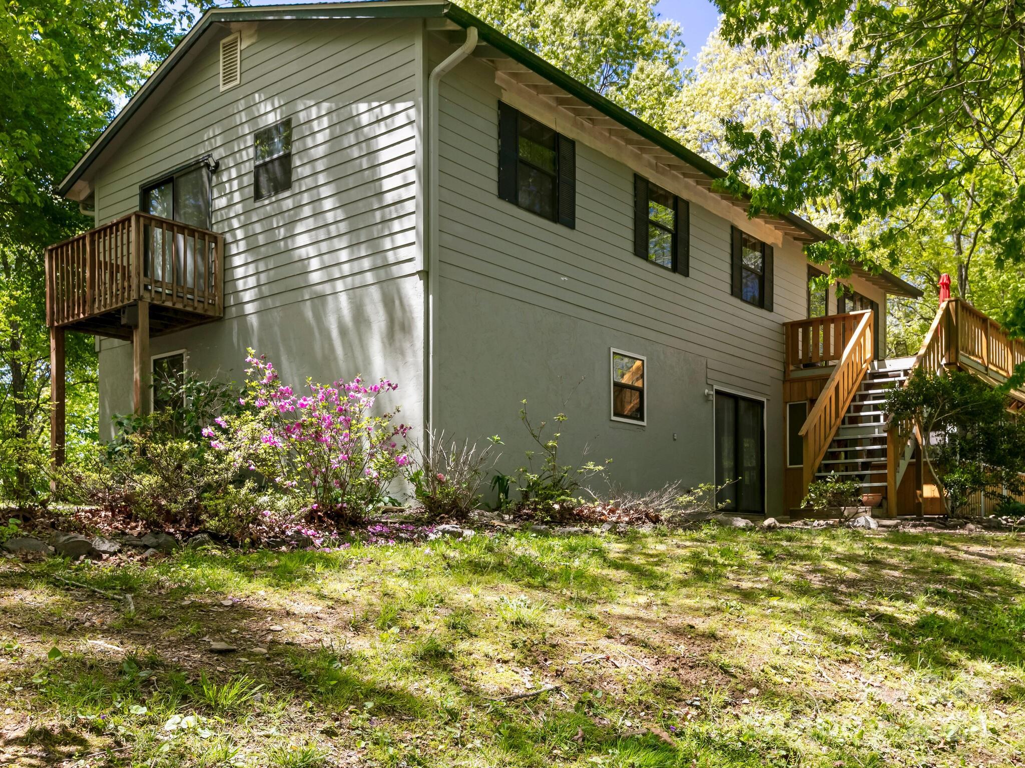 46 New Lite Road Fairview, NC 28730 - Photo 2 of 31 a front view of house with a yard