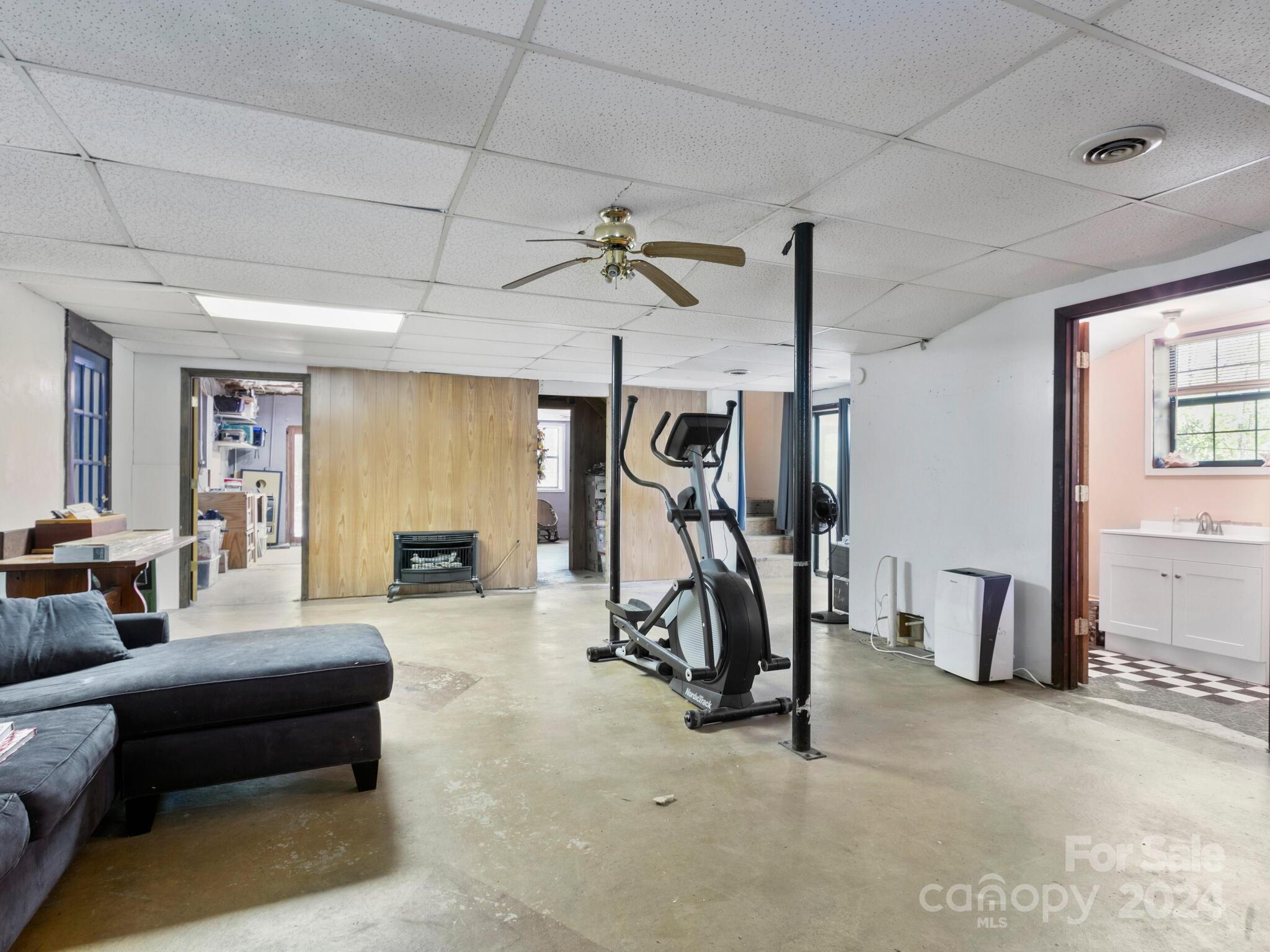 46 New Lite Road Fairview, NC 28730 - Photo 23 of 31 a view of a livingroom with furniture and a ceiling fan