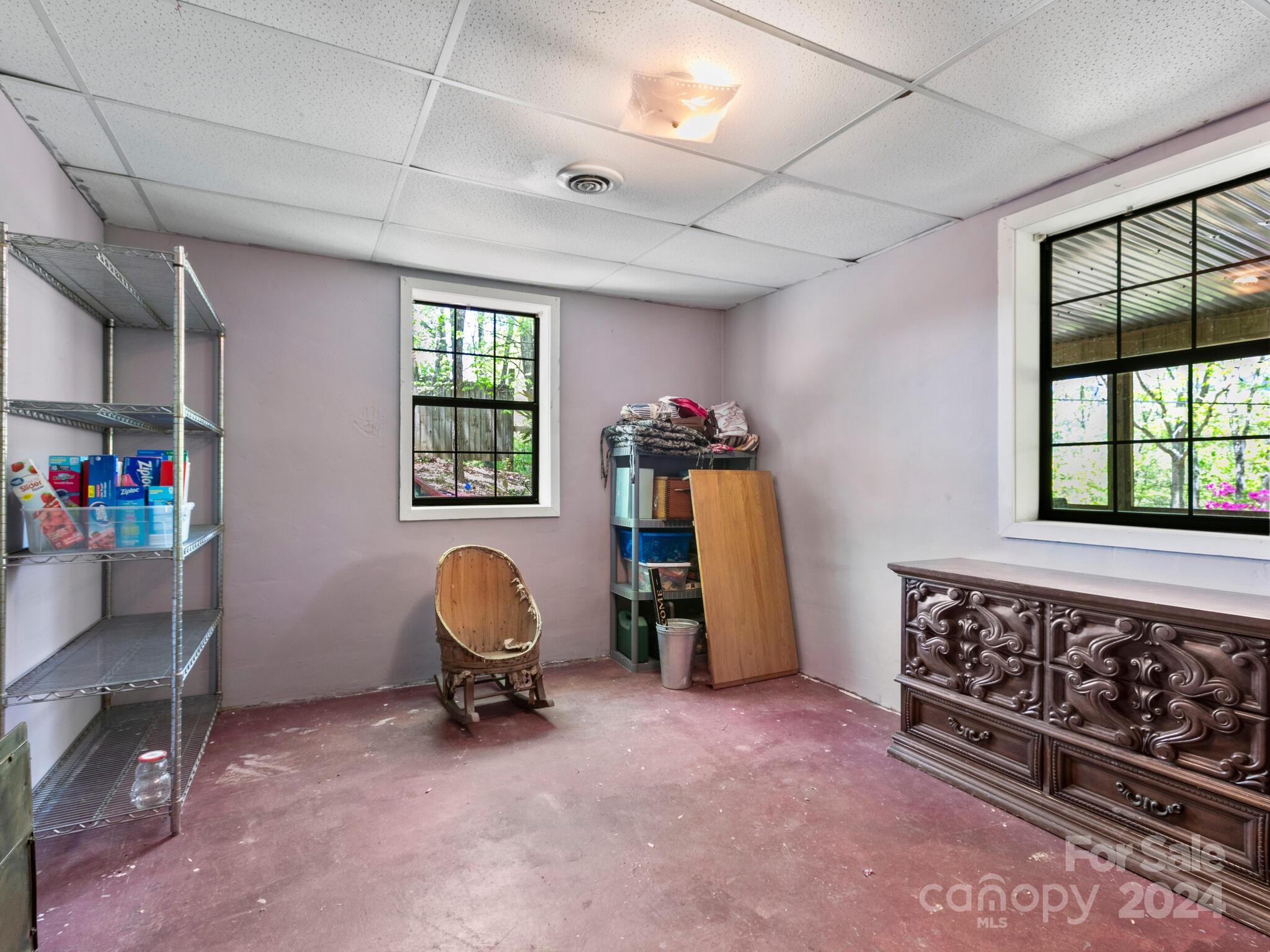 46 New Lite Road Fairview, NC 28730 - Photo 25 of 31 a bedroom with a bed and a window