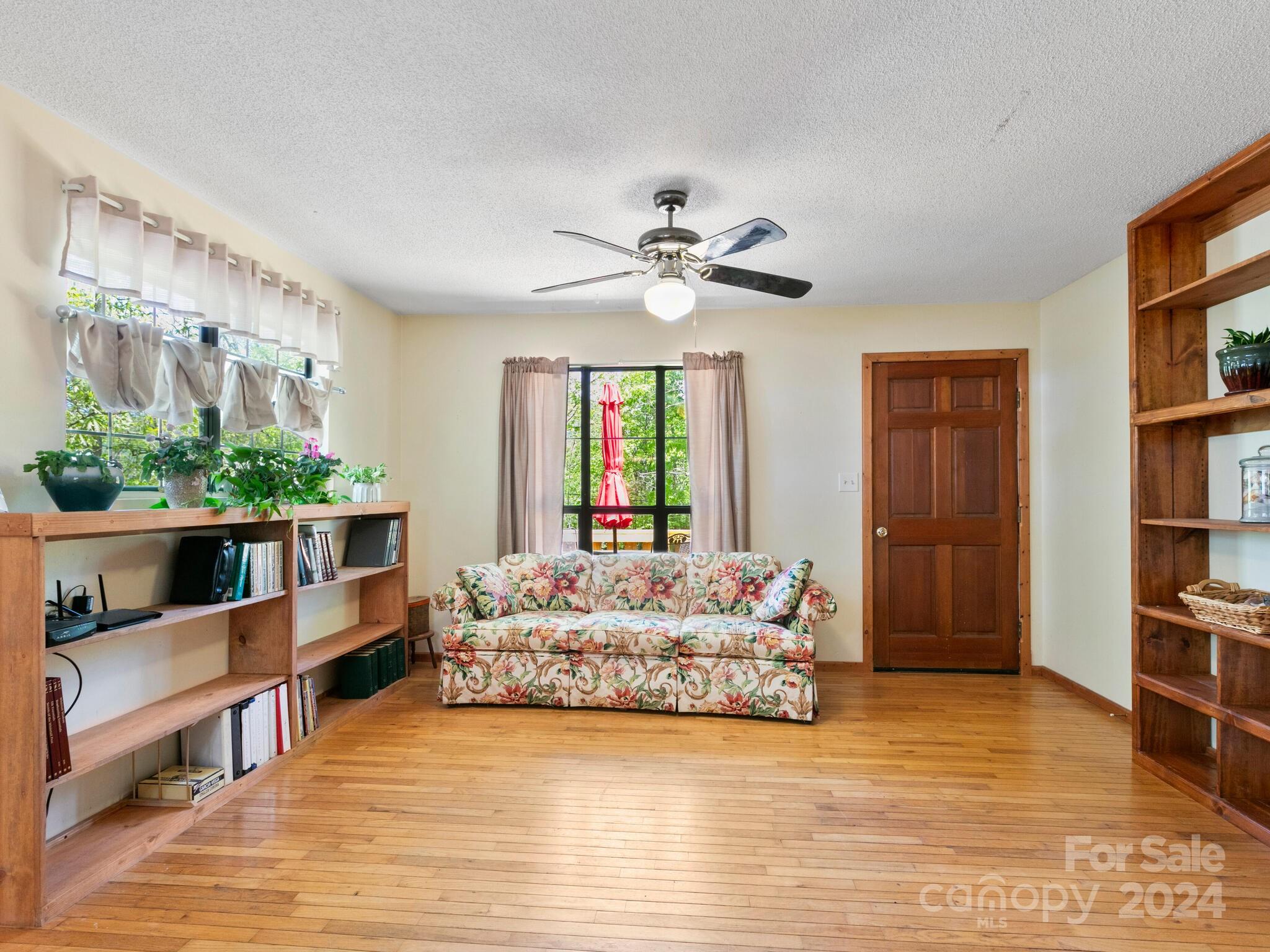 46 New Lite Road Fairview, NC 28730 - Photo 7 of 31 a living room with furniture and a large window