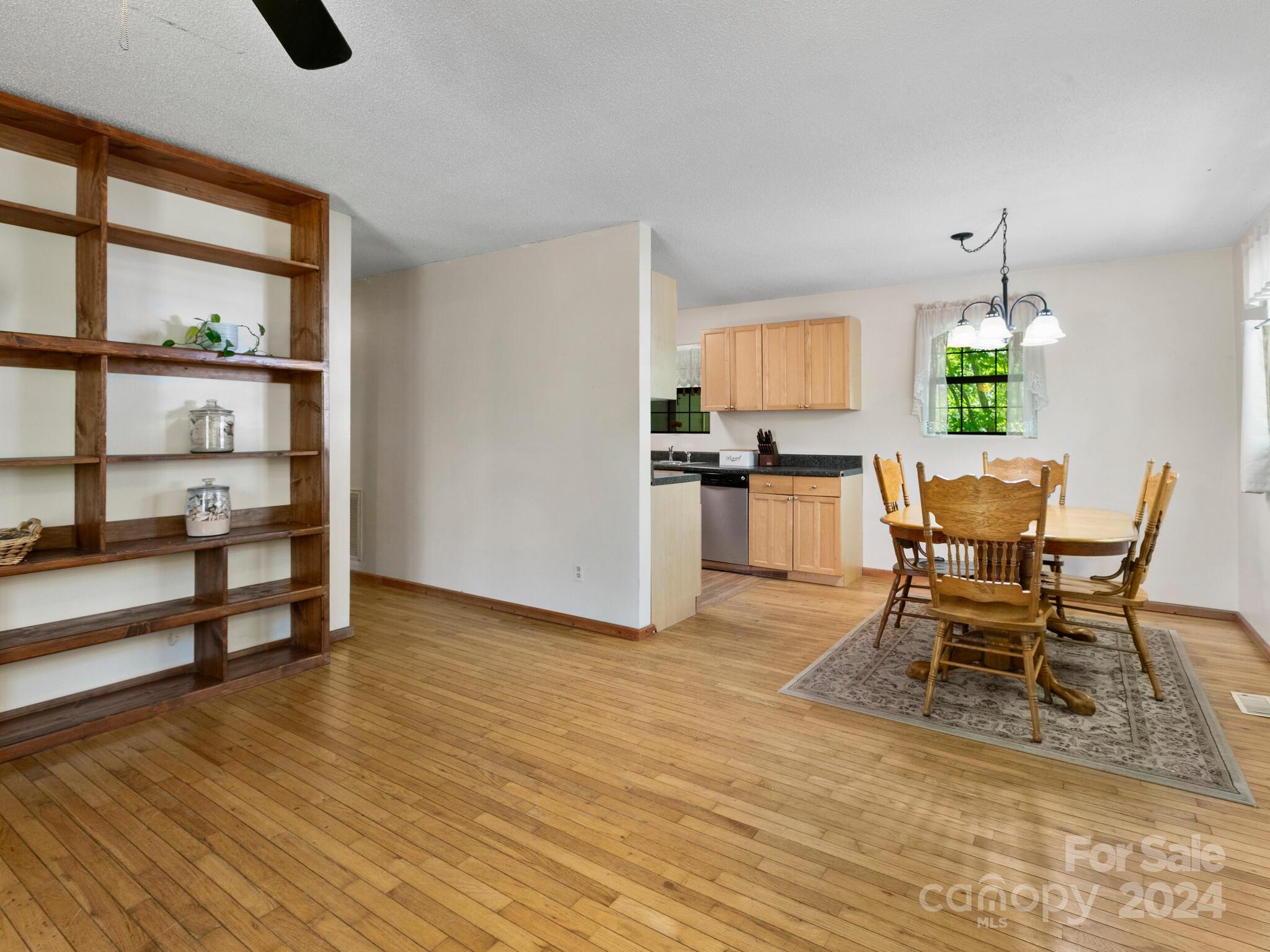 46 New Lite Road Fairview, NC 28730 - Photo 8 of 31 a dining room with furniture and window