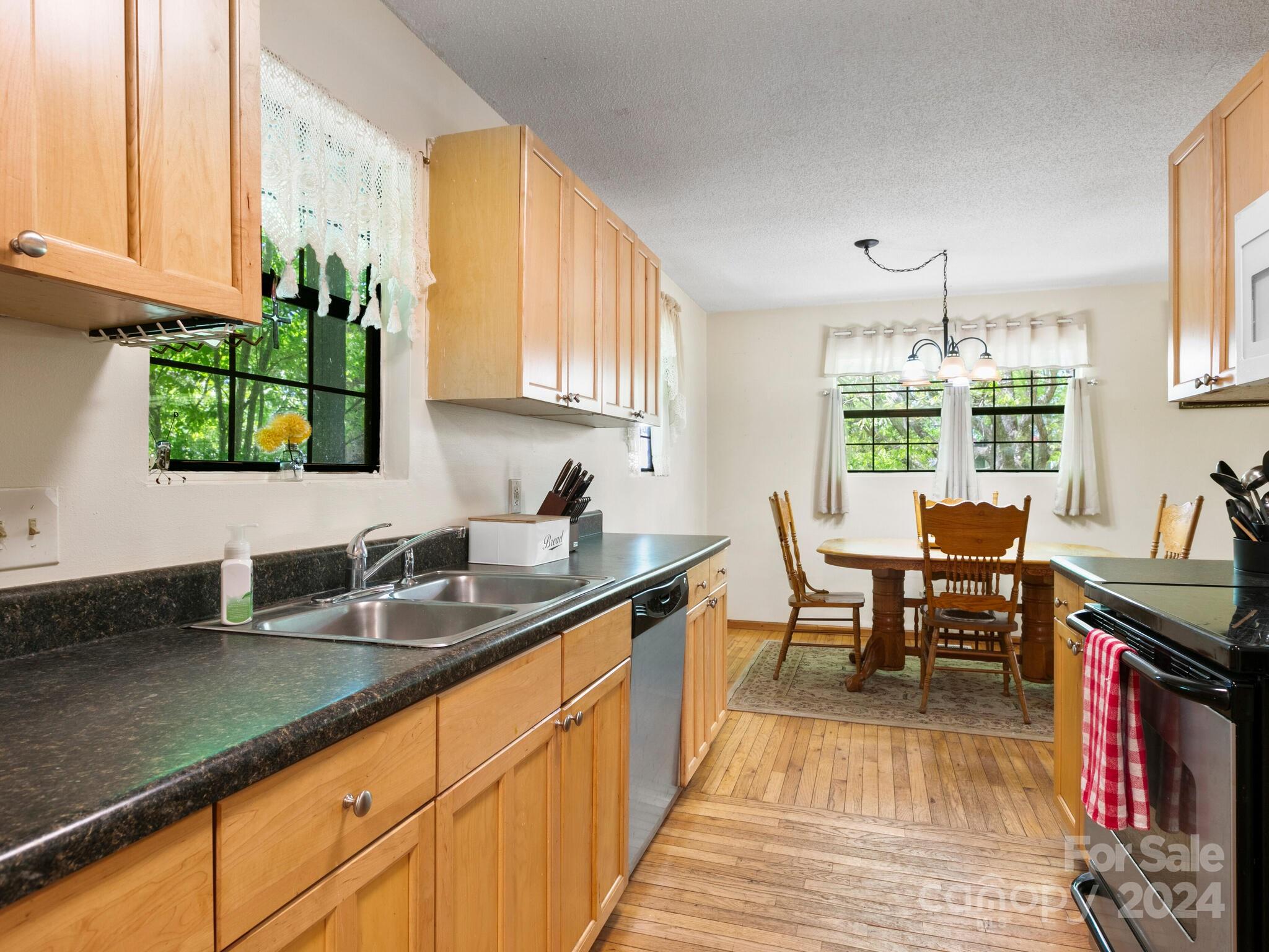 46 New Lite Road Fairview, NC 28730 - Photo 10 of 31 a kitchen with granite countertop lots of counter top space