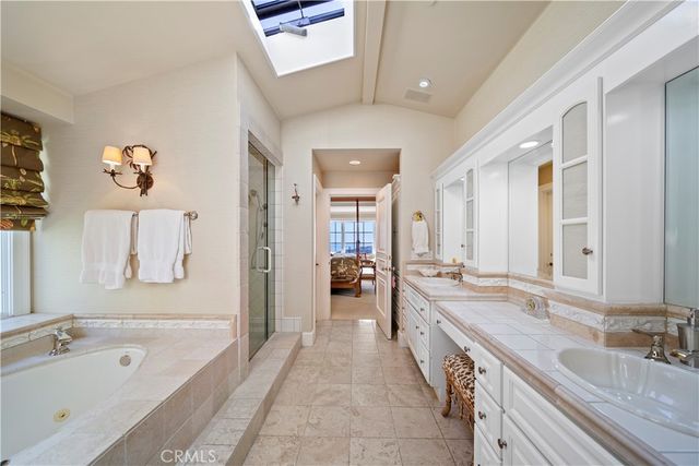 a living room with fireplace furniture and a wooden floor