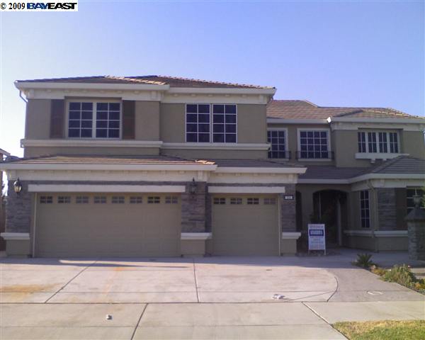 231 Shasta Avenue Ripon, CA 95366 - Photo 1 of 1 a front view of a house with windows