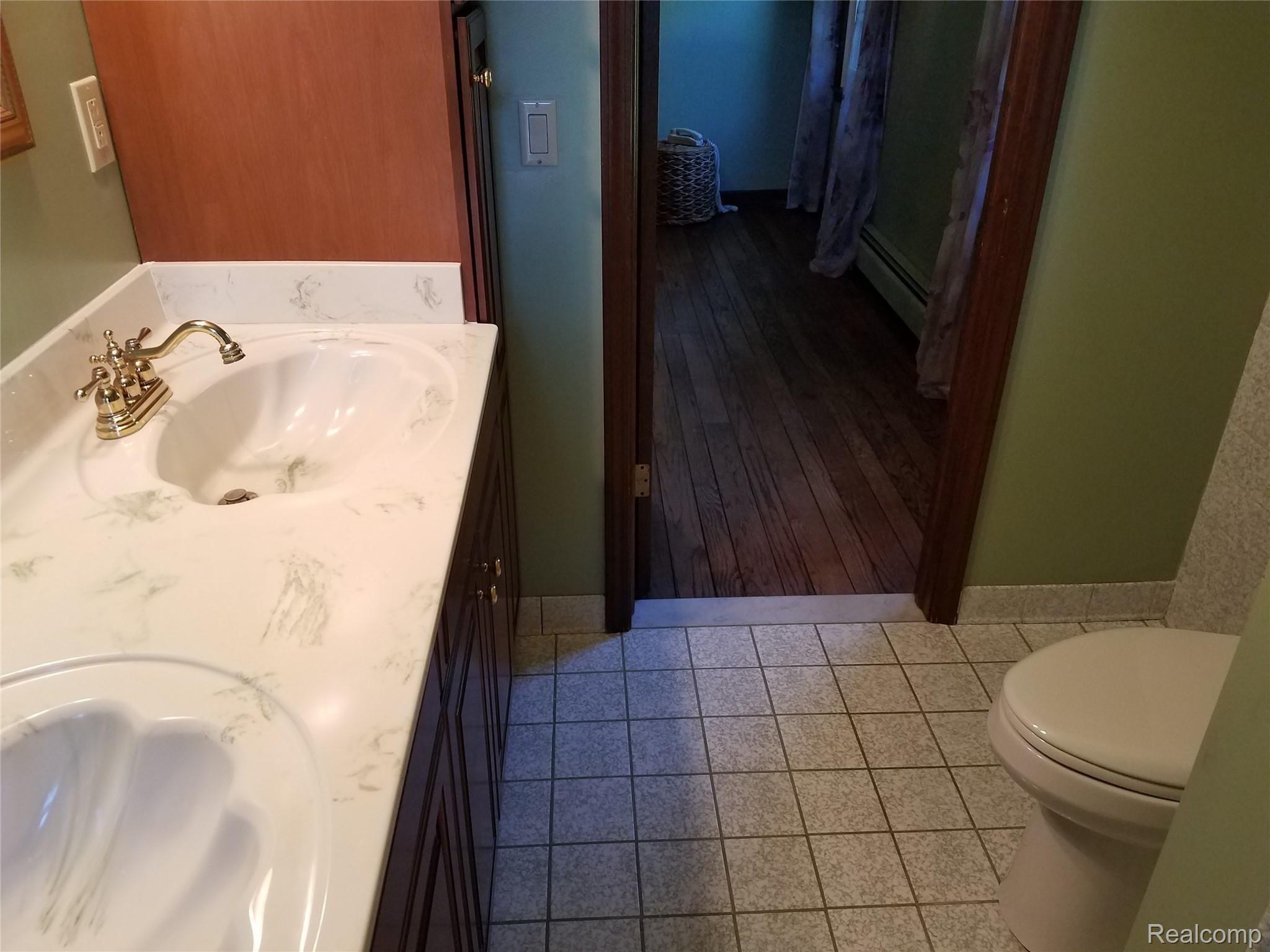 3638 Innisfree Road Howell, MI 48855 - Photo 14 of 45 Master bath to bed.jpg