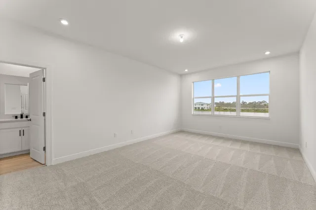 a bathroom with a double vanity sink mirror and