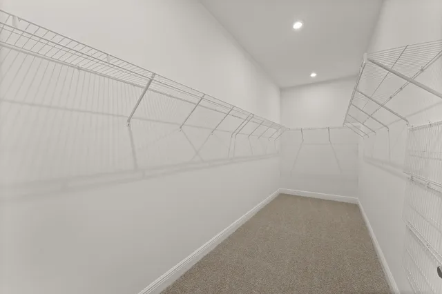 a bathroom with a double vanity sink mirror and shower