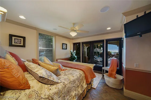 a bathroom with a granite countertop sink a toilet and mirror