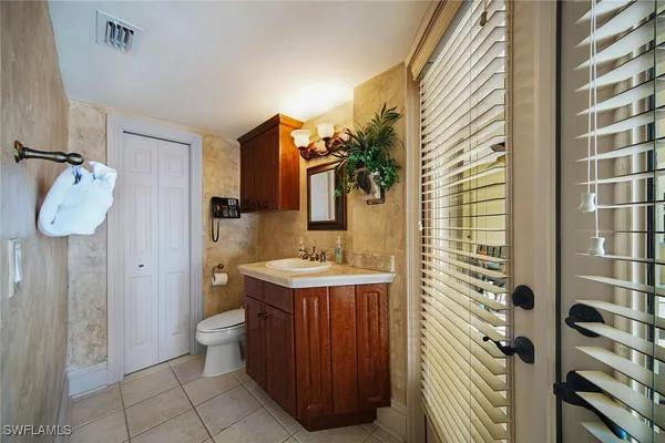 a dining room with many tables and chairs