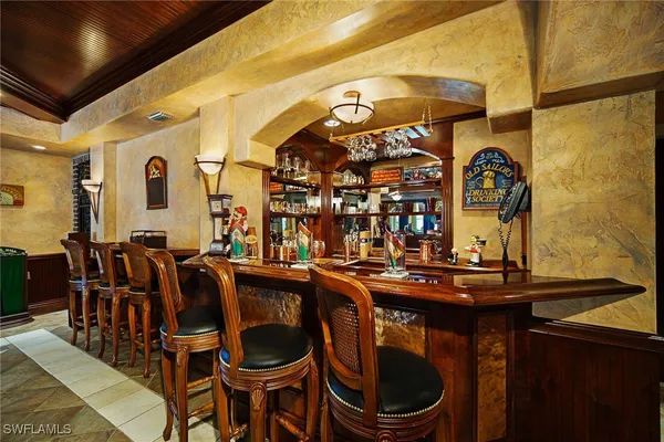 a outdoor space with lots of furniture and a rug