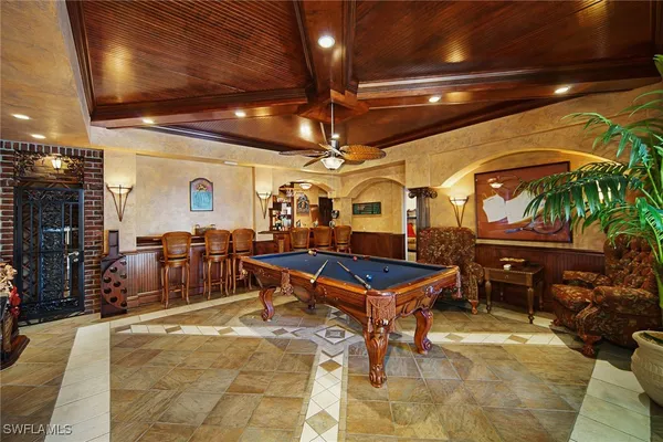 a view of a chairs and table in patio