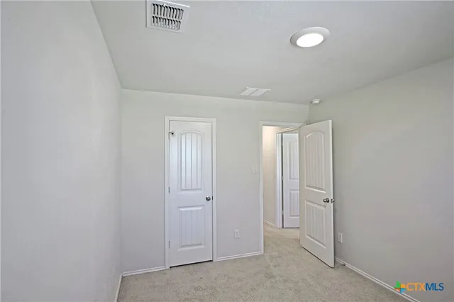 front view of a house with a big yard