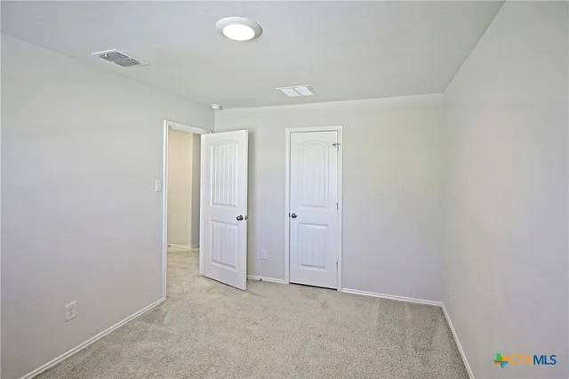 a view of a house with yard and a garden