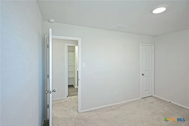 a view of a swimming pool with a sitting space