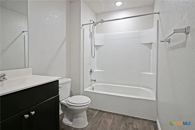 a view of a swimming pool with a lounge chairs