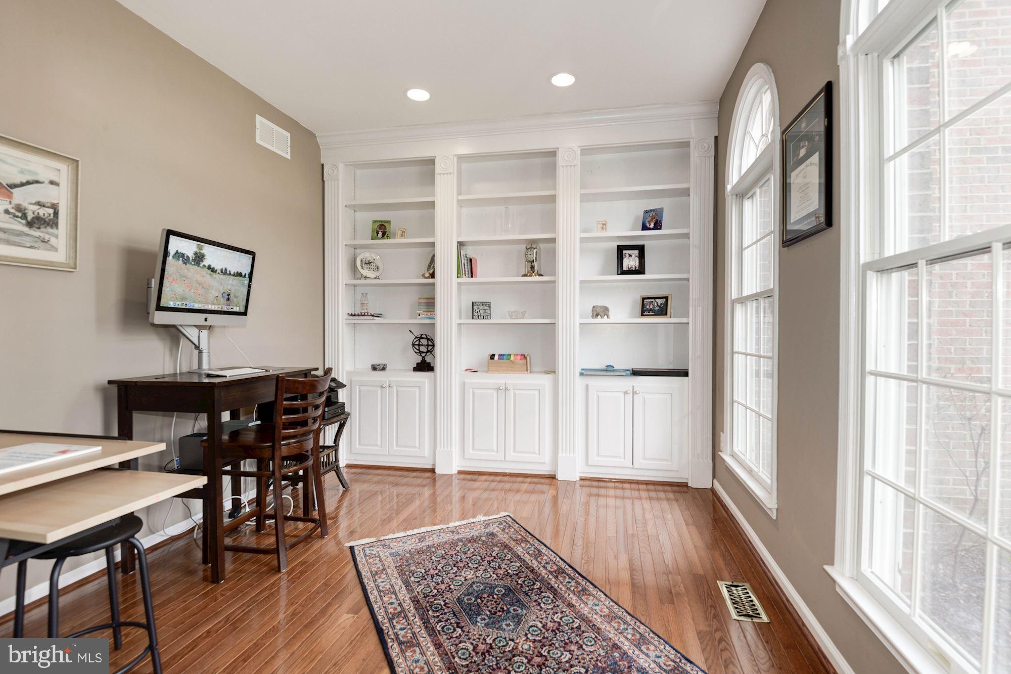 1340 Dasher Lane Reston, VA 20190 - Photo 21 of 59 Main Level Library with built ins