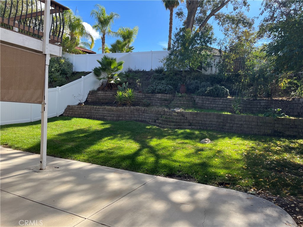 33033 Tulley Ranch Road Temecula, CA 92592 - Photo 14 of 14 a view of a yard with an tree