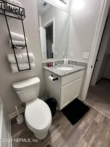 a bathroom with a sink and a toilet