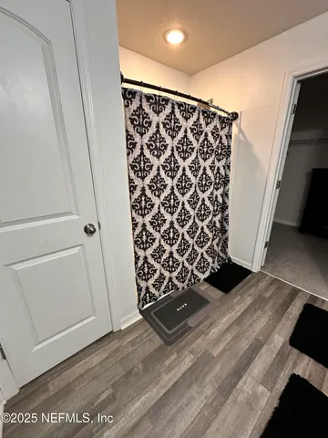 a bathroom with a sink double vanity and a mirror