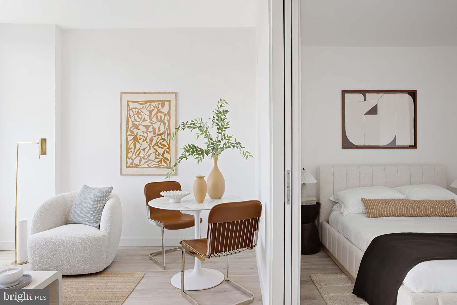 1 Florida Avenue Northeast, Unit 501 Washington, DC 20002 - Photo 6 of 14 a living room with furniture and a potted plant