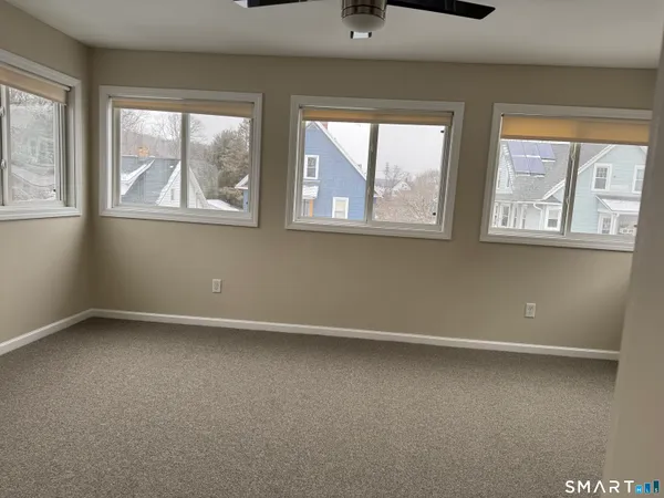 an empty room with windows