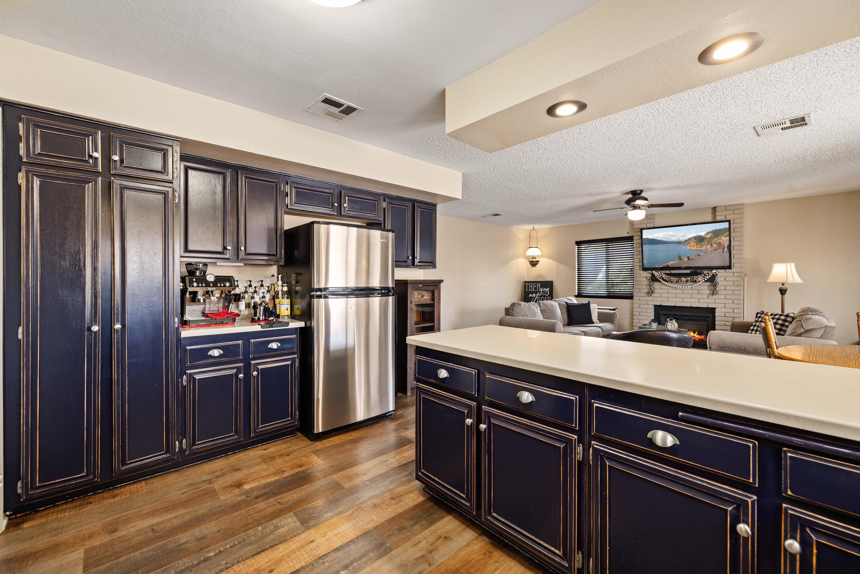 2833 Springfield Place Lancaster, CA 93536 - Photo 12 of 37 a kitchen with stainless steel appliances granite countertop a refrigerator and a sink