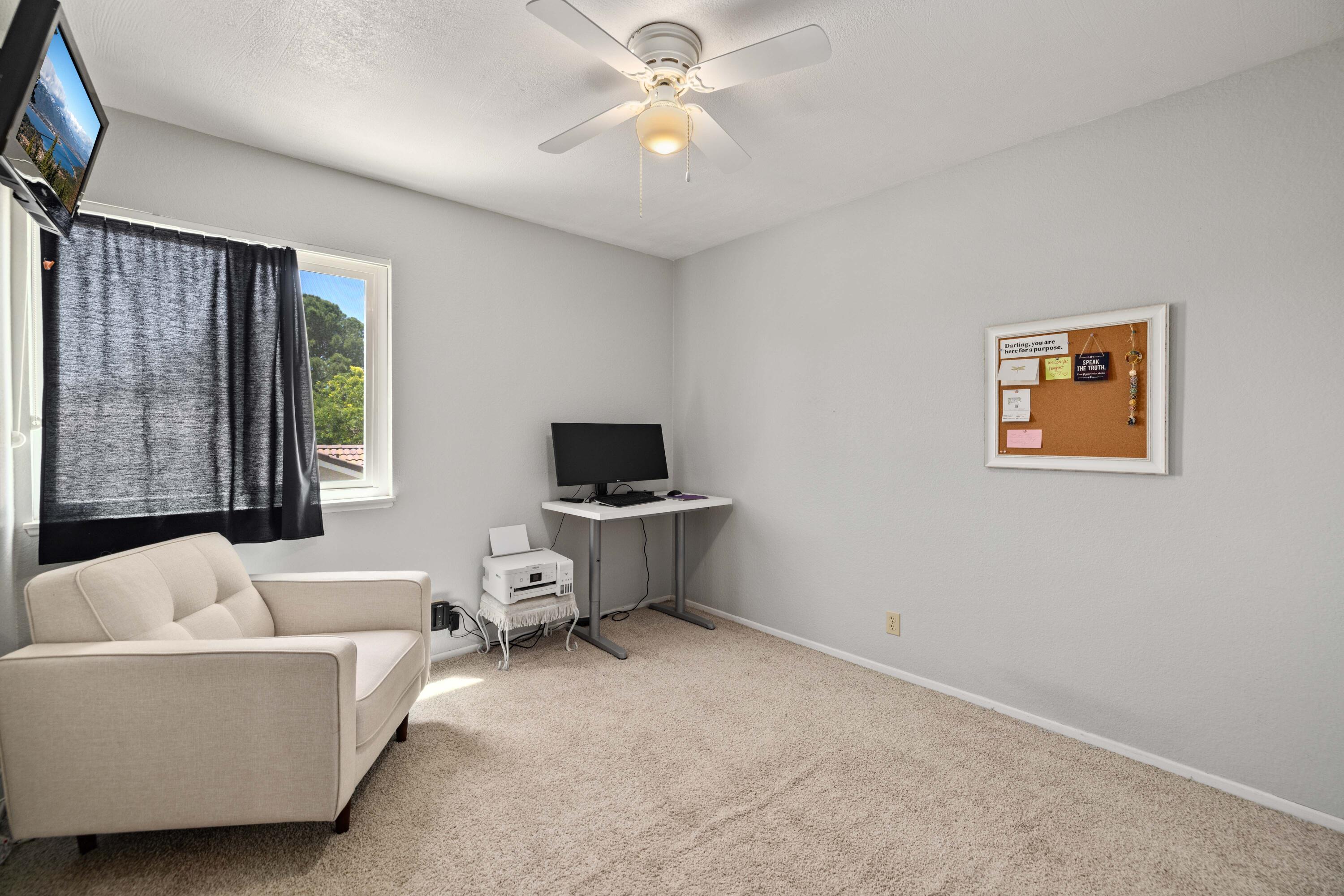2833 Springfield Place Lancaster, CA 93536 - Photo 23 of 37 a living room with furniture and a window