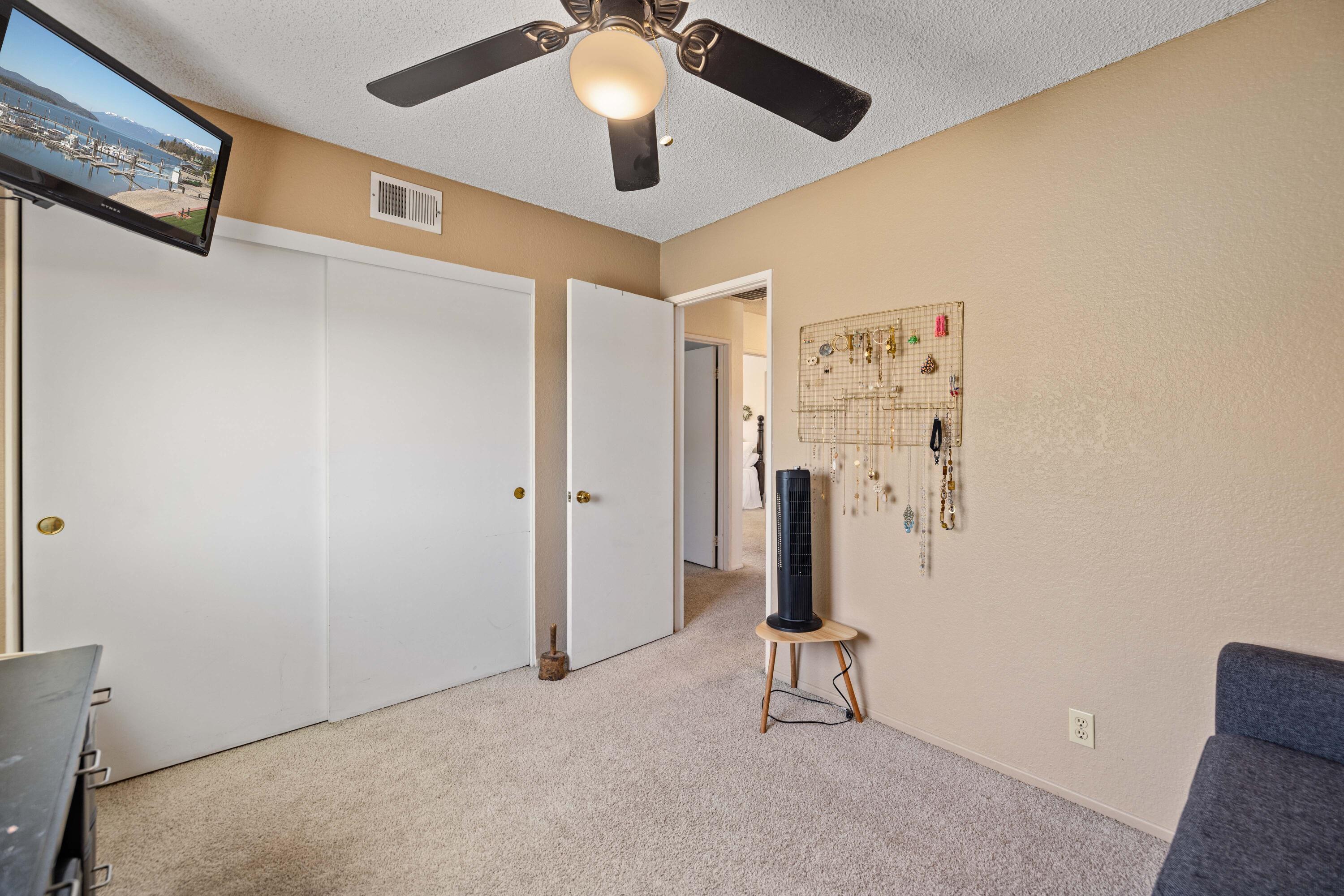 2833 Springfield Place Lancaster, CA 93536 - Photo 26 of 37 a view of a livingroom with a ceiling fan