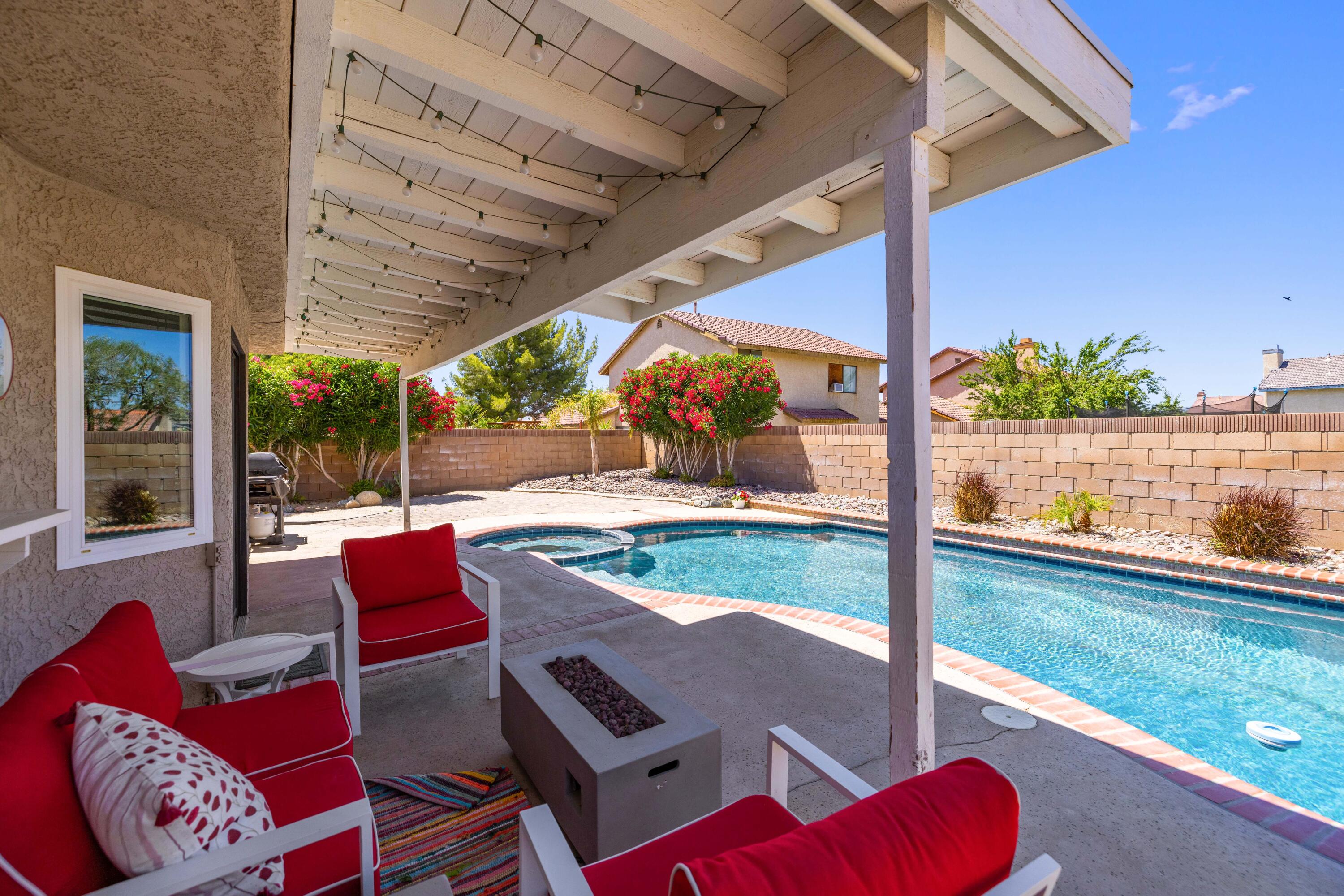 2833 Springfield Place Lancaster, CA 93536 - Photo 31 of 37 a view of yard from deck with patio
