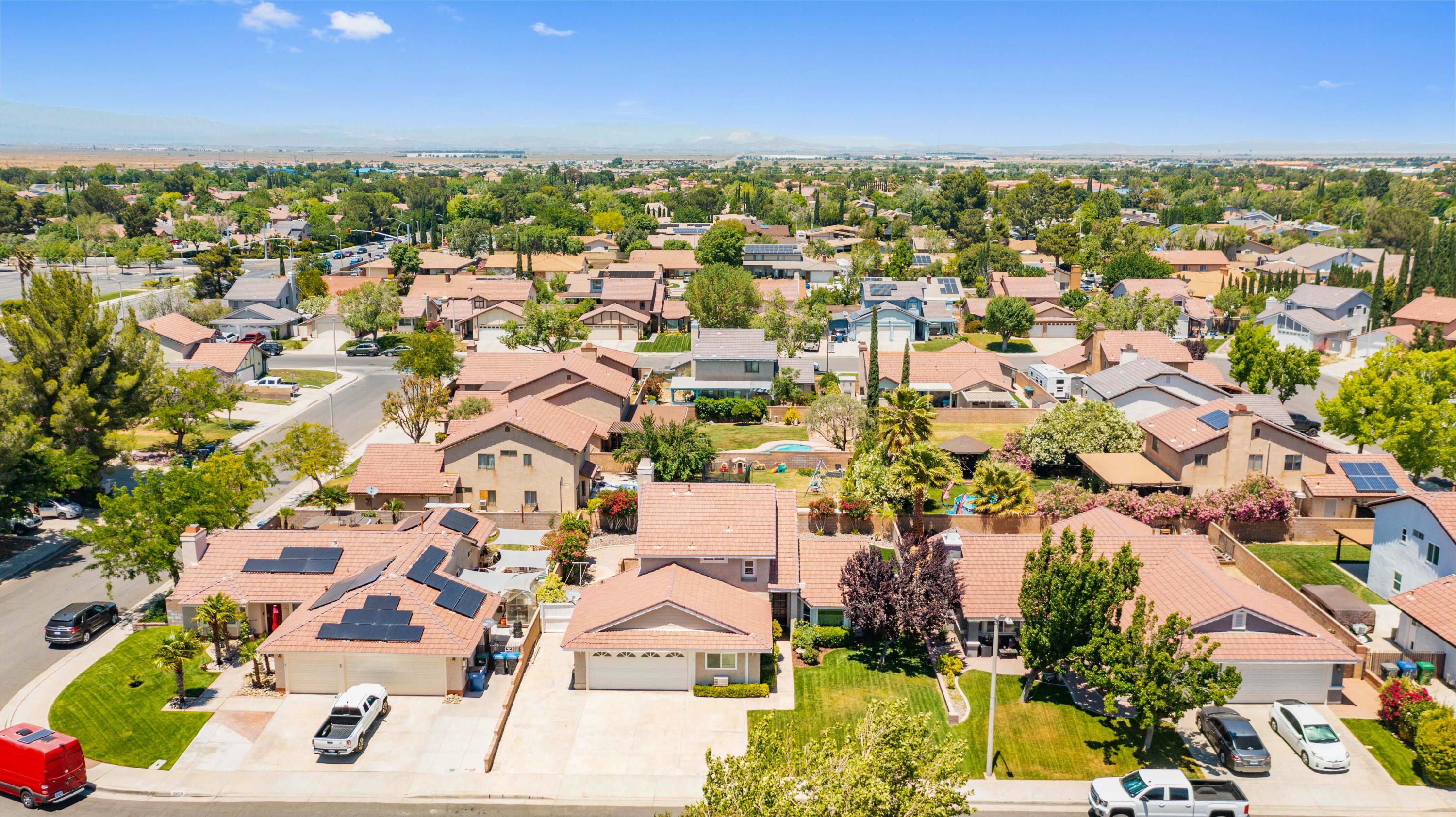 2833 Springfield Place Lancaster, CA 93536 - Photo 35 of 37 an aerial view of residential houses with outdoor space and street view