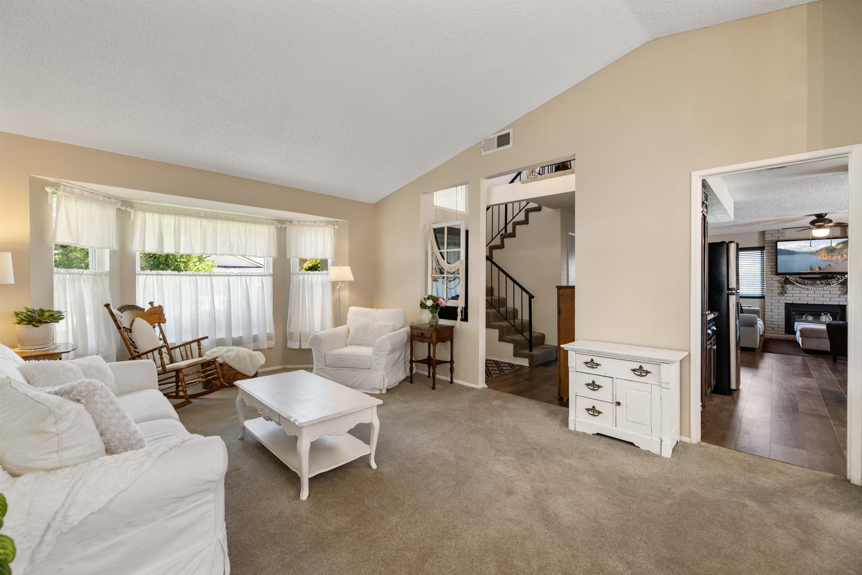2833 Springfield Place Lancaster, CA 93536 - Photo 6 of 37 a living room with furniture and a large window