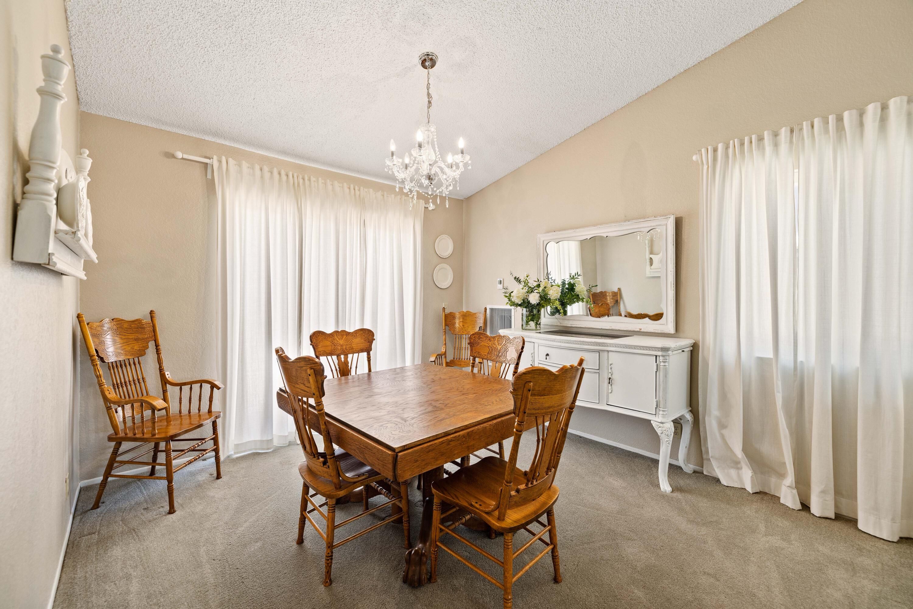 2833 Springfield Place Lancaster, CA 93536 - Photo 9 of 37 a view of a dining room with furniture and window