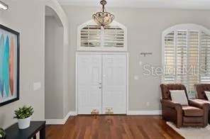 a view of livingroom with furniture and wooden floor