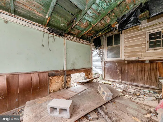 a view of balcony with furniture