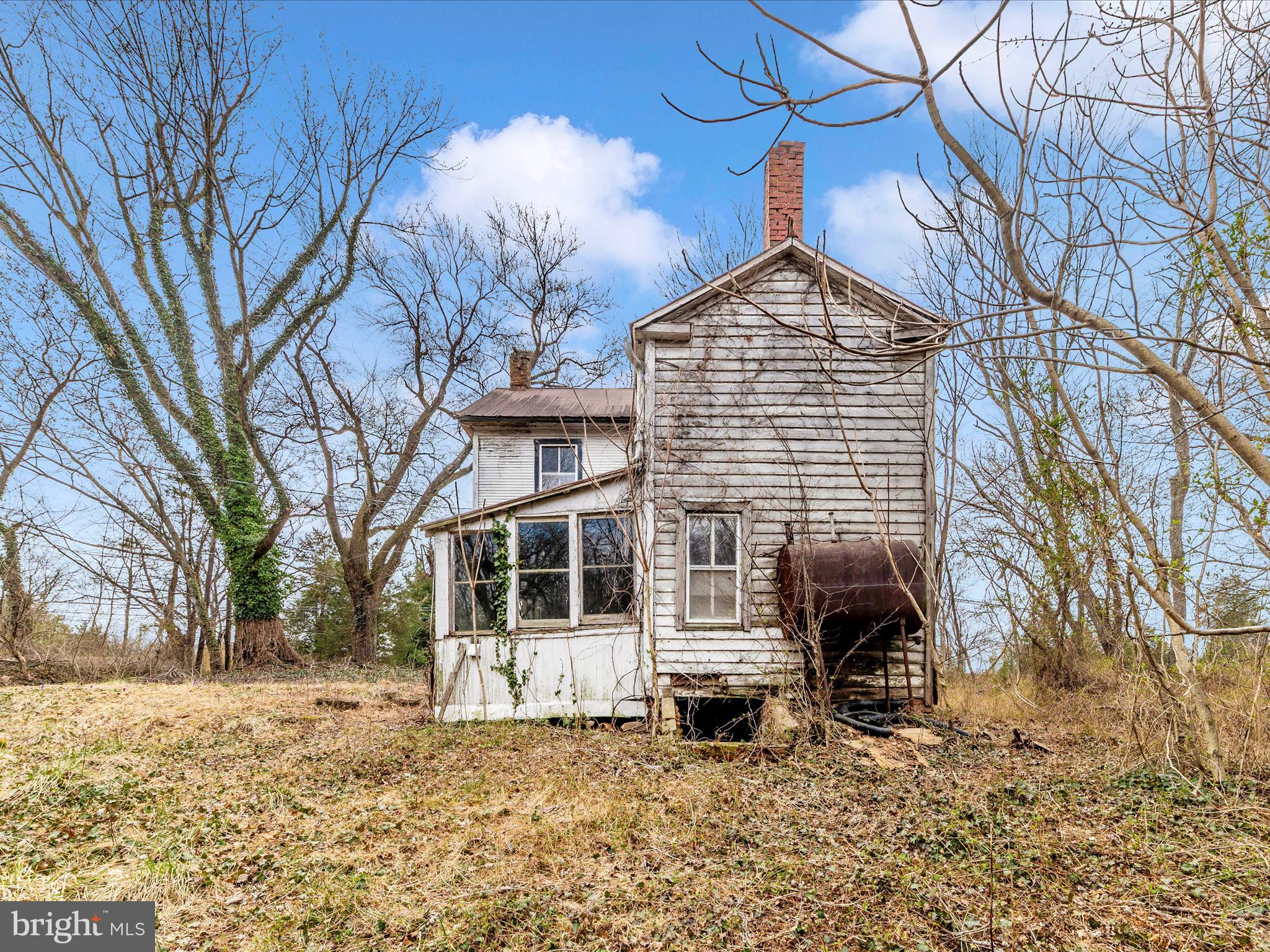 19821 Darnestown Road Beallsville, MD 20842 - Photo 37 of 44 a view of a house with a yard