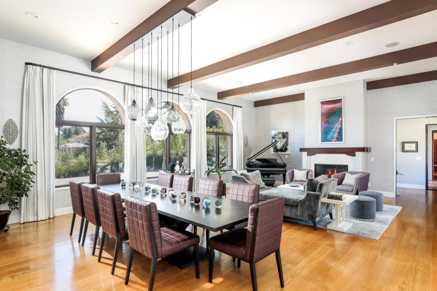 883 Robb Road Palo Alto, CA 94306 - Photo 18 of 33 a view of a dining room with furniture wooden floor and chandelier