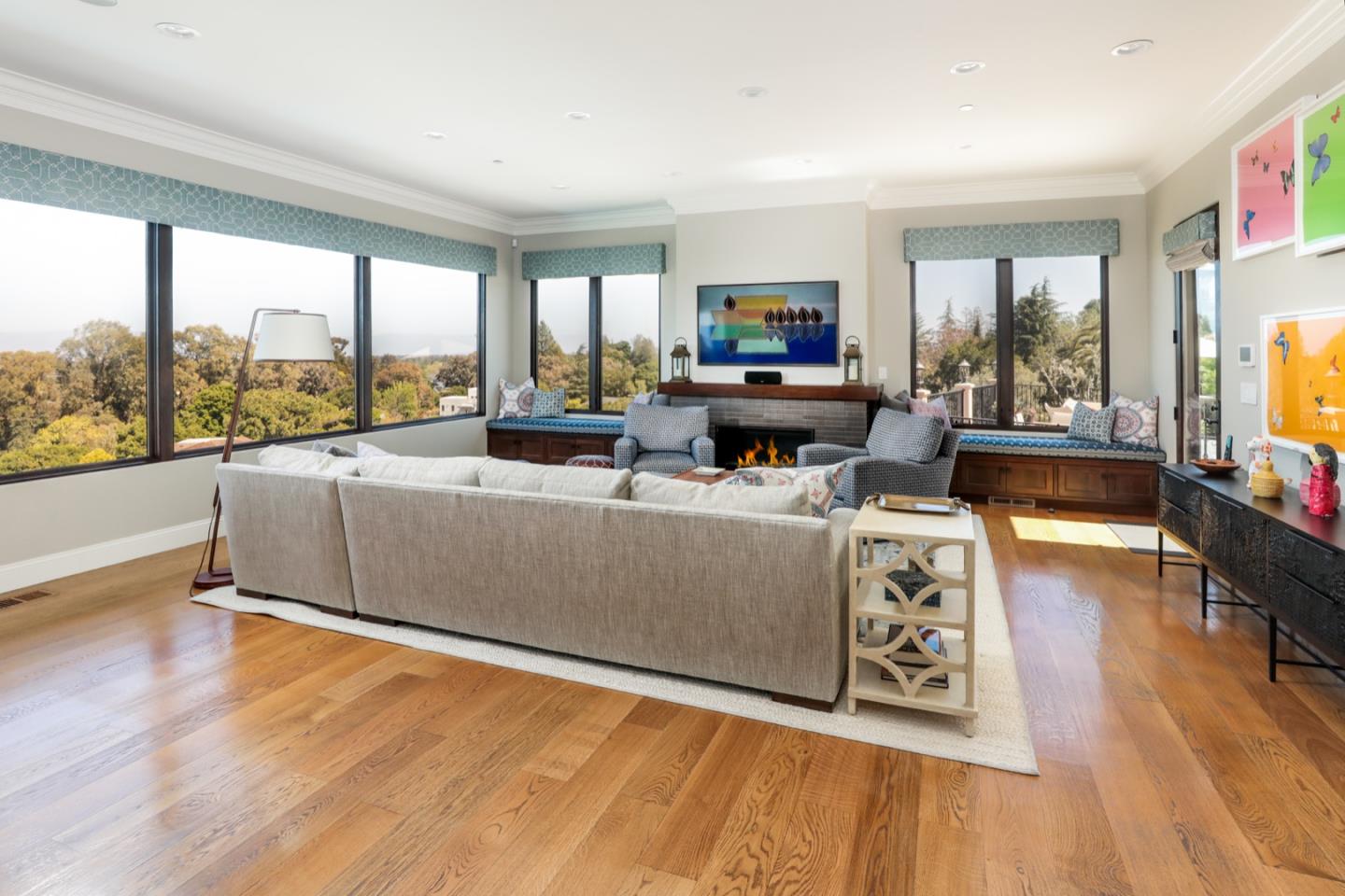 883 Robb Road Palo Alto, CA 94306 - Photo 19 of 33 a living room with furniture and a large window