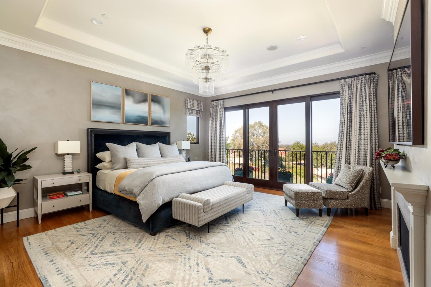 883 Robb Road Palo Alto, CA 94306 - Photo 29 of 33 a spacious bedroom with a bed and a couch