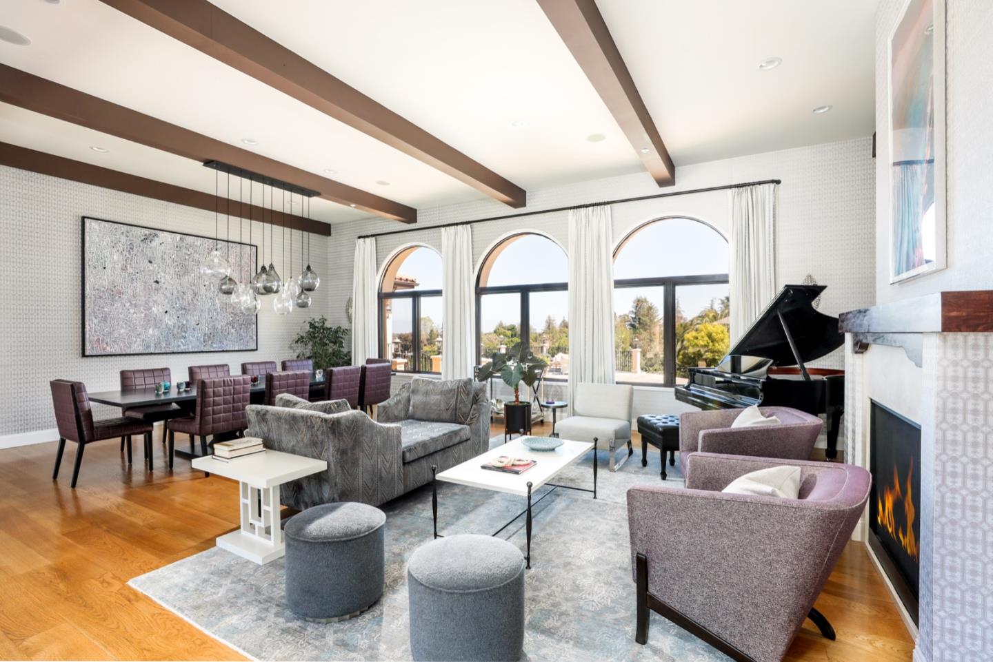 883 Robb Road Palo Alto, CA 94306 - Photo 31 of 33 a living room with furniture a fireplace and large windows