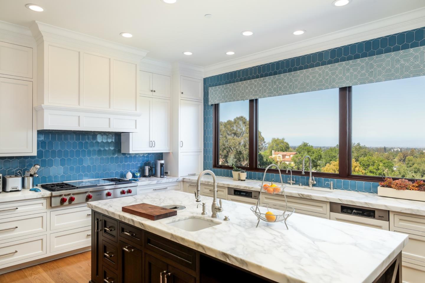 883 Robb Road Palo Alto, CA 94306 - Photo 32 of 33 a kitchen with a sink stove and cabinets