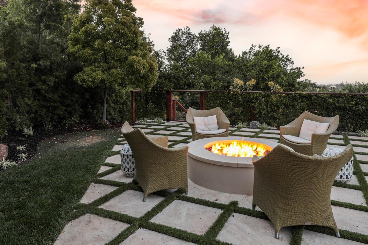 883 Robb Road Palo Alto, CA 94306 - Photo 6 of 33 a view of a patio with table and chairs with wooden fence