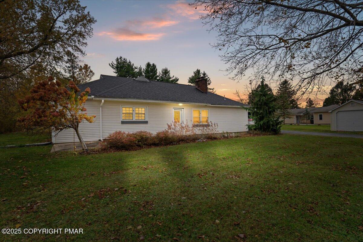 1215 Country Club Road Clarks Summit, PA 18411 - Photo 2 of 50 a front view of house with yard and green space