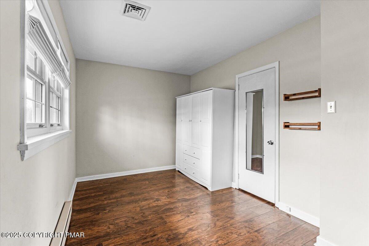 1215 Country Club Road Clarks Summit, PA 18411 - Photo 28 of 50 a view of an empty room with closet and windows