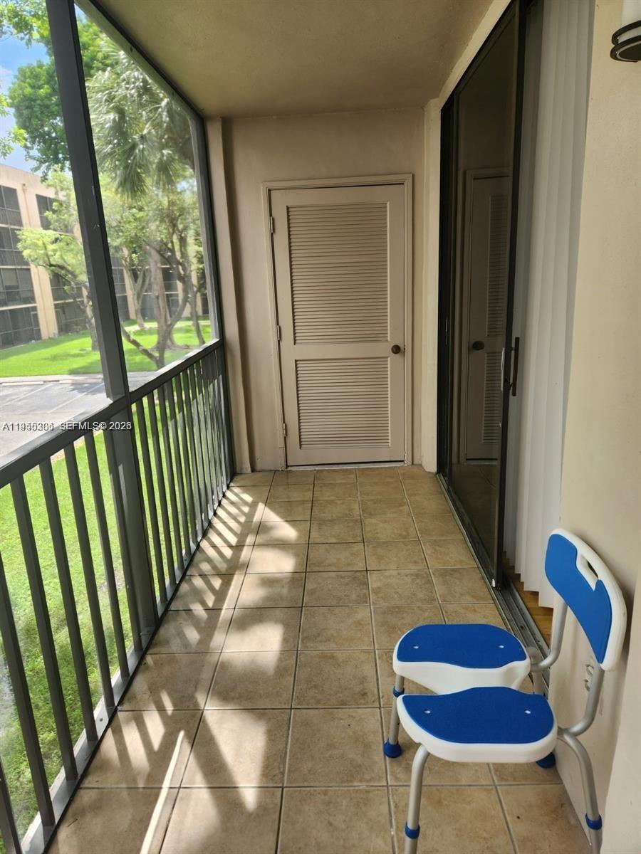 8500 Southwest 133rd Avenue Road, Unit 216 Miami, FL 33183 - Photo 11 of 16 BALCONY WITH TWO STORAGE