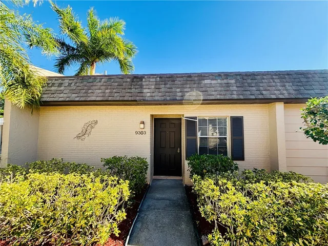 a kitchen with stainless steel appliances granite countertop a sink and a stove