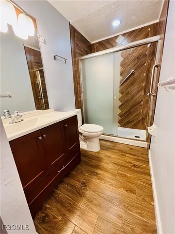 a view of swimming pool from a balcony