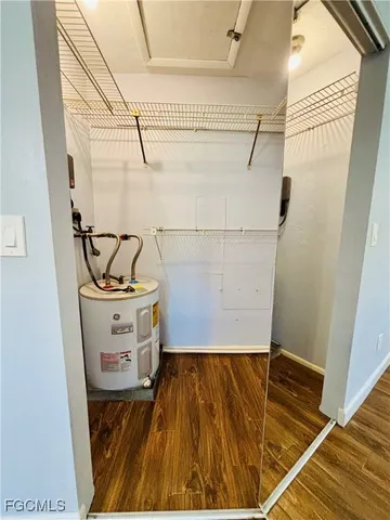 a large tree in front of a house