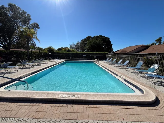 a view of a swimming pool and outdoor space