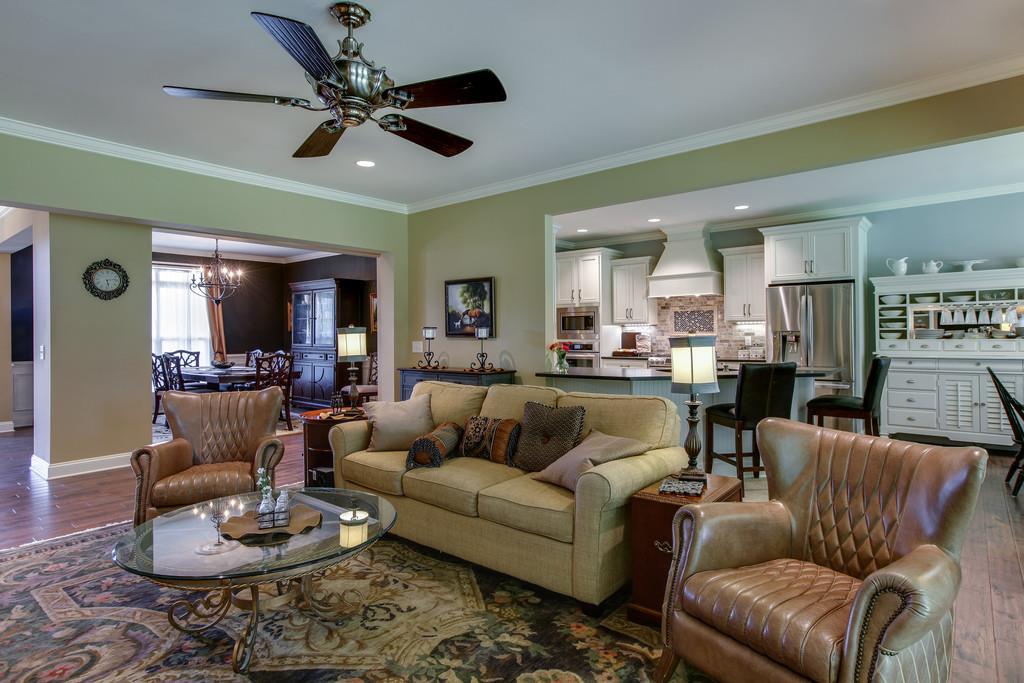 7901 Pinewood Road Fairview, TN 37062 - Photo 12 of 30 a living room with furniture and a wooden floor