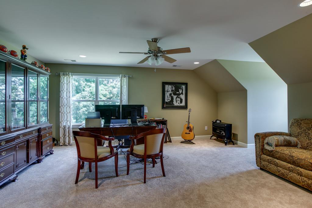 7901 Pinewood Road Fairview, TN 37062 - Photo 26 of 30 a view of a livingroom with furniture window and outside view